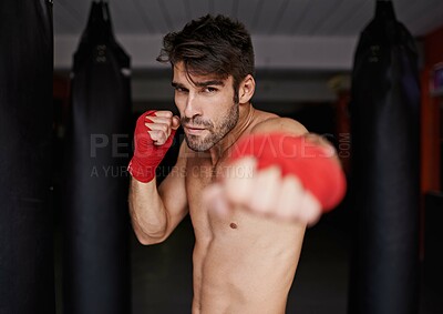 Buy stock photo Boxer, gym and portrait for fitness, punch and wellness in strong training for confidence to fight. Man, sport and boxing athlete in sports, challenge and shirtless ready to exercise  for mma 