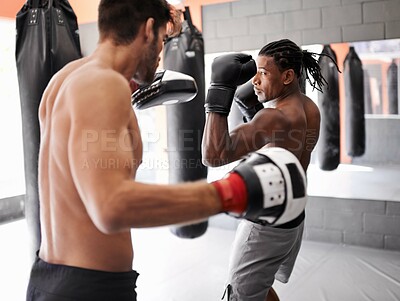 Buy stock photo Men, training for boxing and fitness, sport and coaching with athlete and personal trainer for workout in gym. Exercise, skill and kickboxing with boxer team practice, MMA and challenge with action