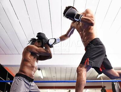 Buy stock photo Men, punch and practice for match in ring, fitness and topless for exercise and workout. People, low angle and performance for challenge or fighting, training and combat for competition in sports