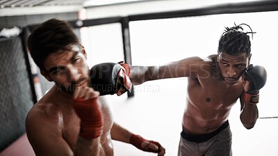 Buy stock photo Punch, pain and men sparring for kickboxing competition, challenge and fitness with fight sports in gym. Boxing match, strong fighter and knockout with exercise, practice and power in battle together