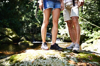 Buy stock photo Hiking, rock or legs of couple in nature, forest or park on a trekking adventure on outdoor holiday. Man, woman or people in woods for travel or journey with footwear, shoes or wellness on vacation