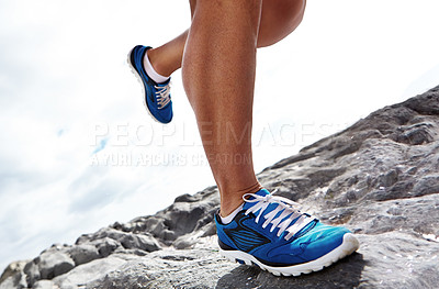 Buy stock photo Closeup, running shoe and rocky terrain or nature, fitness and exercise for health. Footwear, trail and cardio jogging for marathon training, fun and wellness on off road and cross country routes  