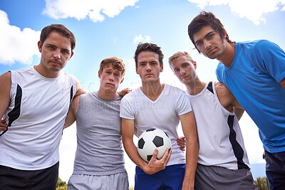 Buy stock photo Soccer player, team and portrait in low angle, outdoor and together with hug for training, exercise or workout. People, sports and football with scrum, embrace and solidarity for game in competition
