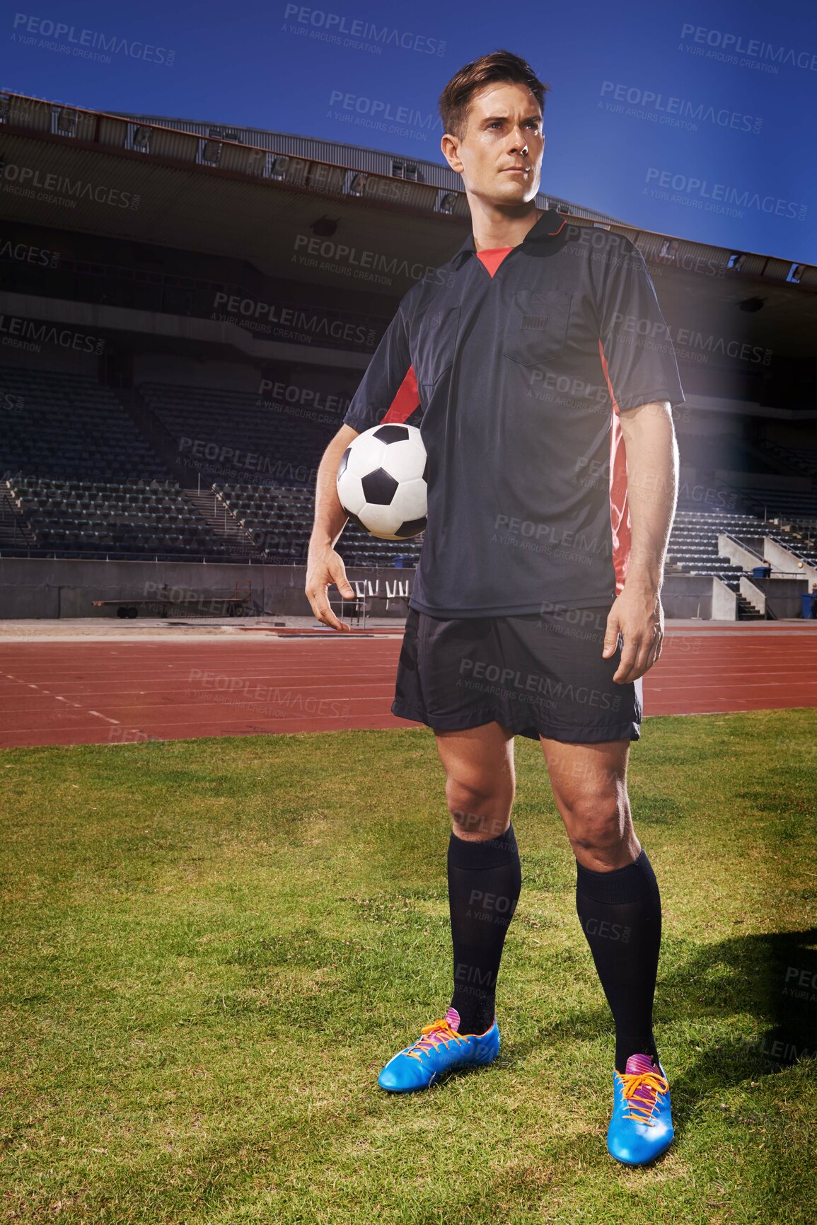 Buy stock photo Man, stadium and think with soccer ball for training with workout or practice for game, fitness and tournament in France. Male person, player and exercise for sport or soccer career with warm up.
