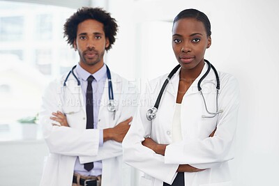 Buy stock photo Black people, portrait and doctors with arms crossed for healthcare, confidence in medicine and team at hospital. Cardiovascular surgeon, health and medical professional collaboration with pride