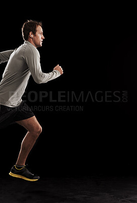 Buy stock photo Man, cardio and running exercise in studio for athlete performance or marathon, training or black background. Male person, fitness and sports with mockup space for healthy, workout or competition