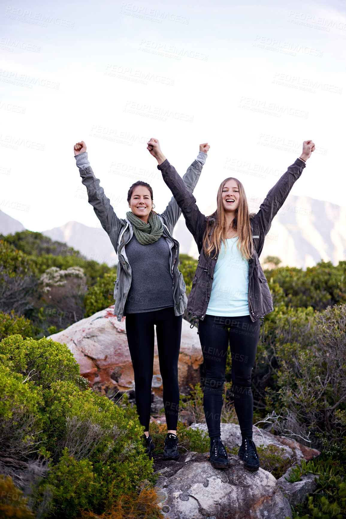 Buy stock photo Woman, friends and portrait for hiking celebration on mountain for exercise training, trekking or environment. Female people, face and arms up for nature workout with cardio, happiness or journey