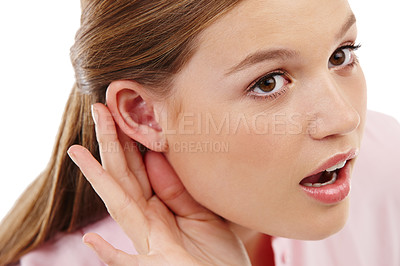 Buy stock photo Female person, ear and listening to gossip, rumour and gesture as spy to hear serious whisper in secret. Curious, woman and palm hearing to concentrate on interesting news or information in studio