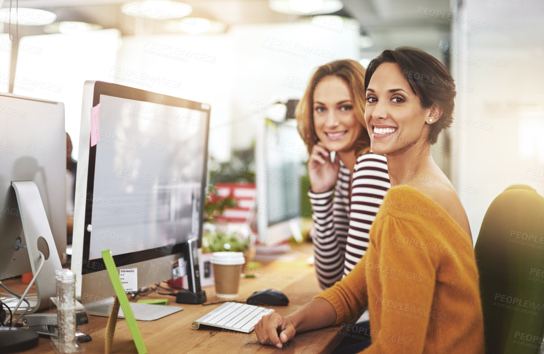 Buy stock photo Computer, portrait and happy business women in office at table in startup company for creative career. Face, coworking and smile of team together, entrepreneur or professional web designer at desk