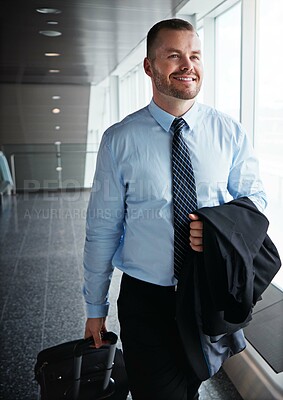 Buy stock photo Walking, happy or man in airport thinking of company trip with suitcase or luggage for commute. Proud businessman, smile or corporate worker in hall for journey, flight or international travel 