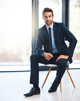 Buy stock photo Chair, portrait and window with business man in office for ambition, career or job opportunity. Corporate, flare and suit with confident young employee in professional workplace for start of career