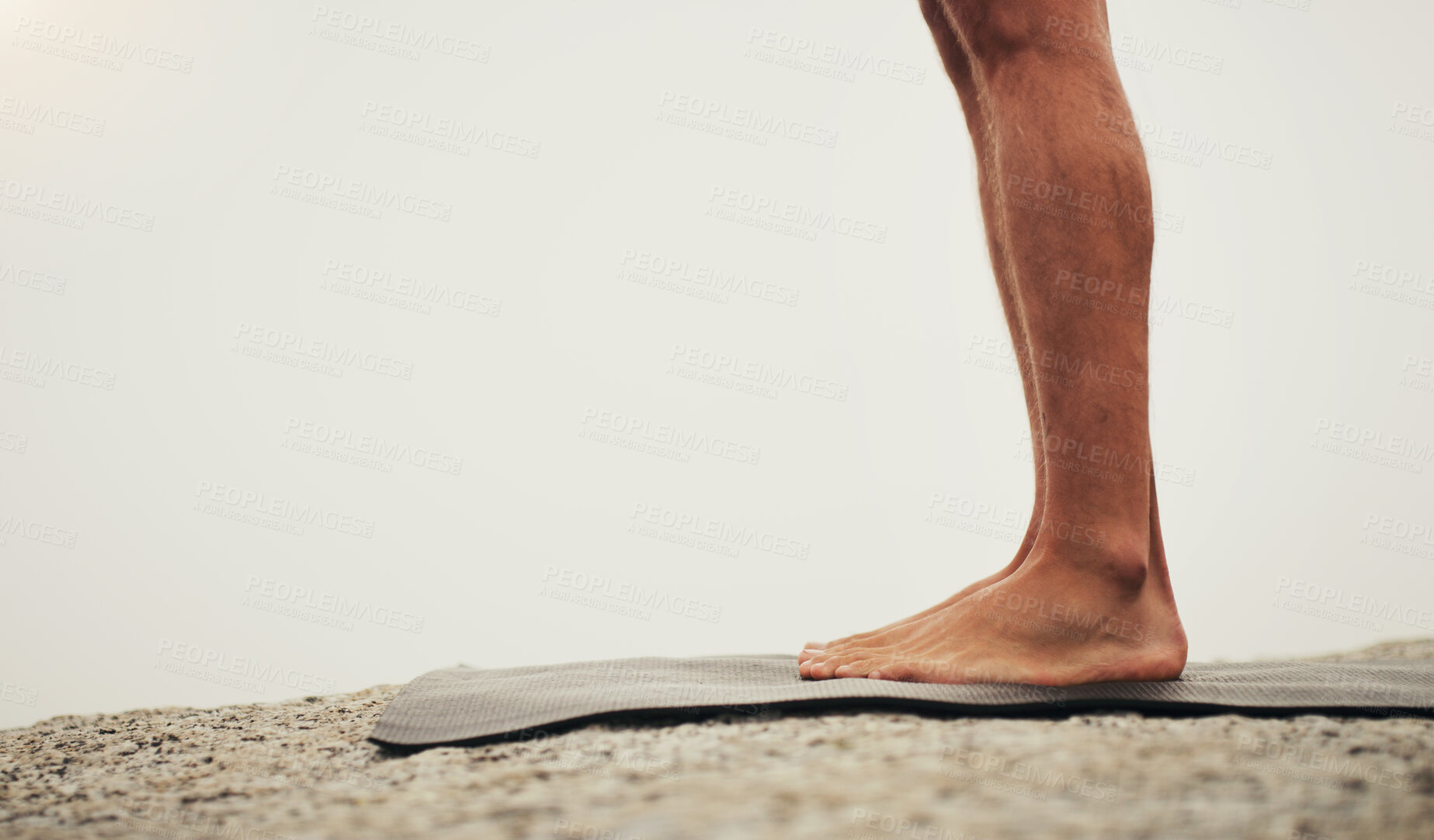 Buy stock photo Rock, yoga or feet of man in outdoor meditation for wellness, peace and mindfulness in nature. Mockup space, person or spiritual yogi on ground in Miami, USA for awareness, legs or chakra balance