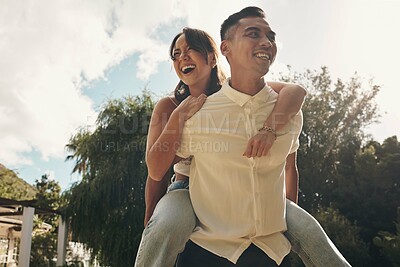 Buy stock photo Happy, couple and piggyback outdoor on date in garden, park or adventure on holiday or vacation. People, play and relax in backyard with fun journey, game or partner support woman with ride on back