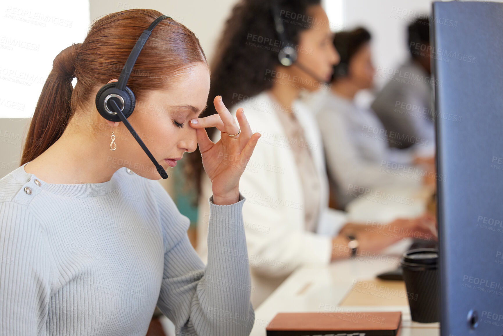 Buy stock photo Portrait, woman and headphone with headache at work for call center or customer care in office with coworkers. Female person, stress and discomfort in pain at telemarketing, company and workplace