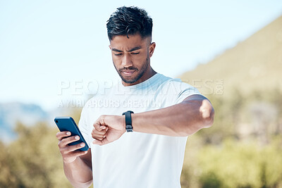 Buy stock photo Man, fitness and checking time with watch in nature for tracking performance, steps or workout schedule. Male person, runner or athlete with wristwatch for monitoring heart rate in outdoor exercise