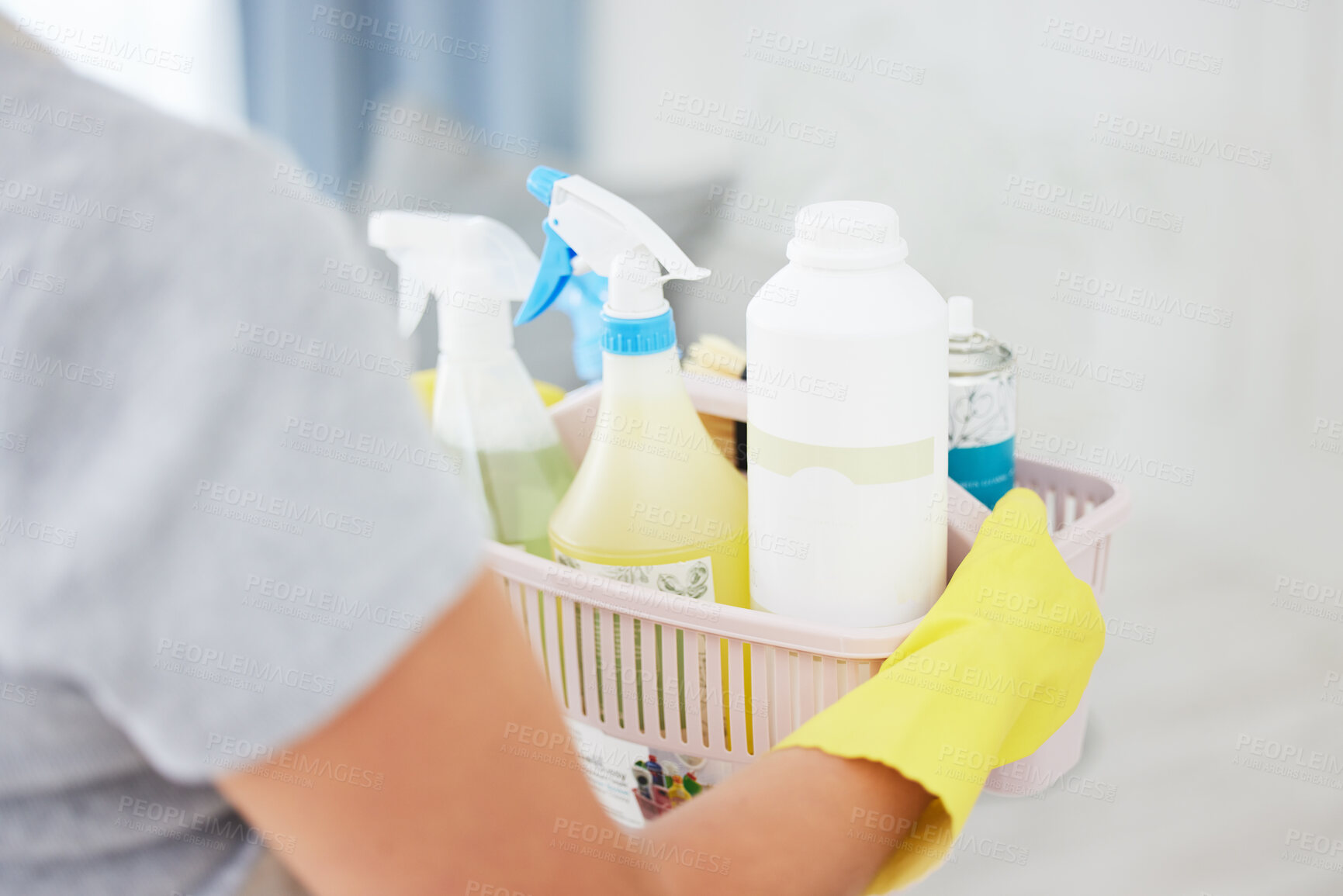 Buy stock photo Person, hands and basket with cleaning supplies for housekeeping, disinfection or domestic detergence. Closeup of cleaner or maid with bucket, gloves or chemicals for dirt, bacteria or germ removal