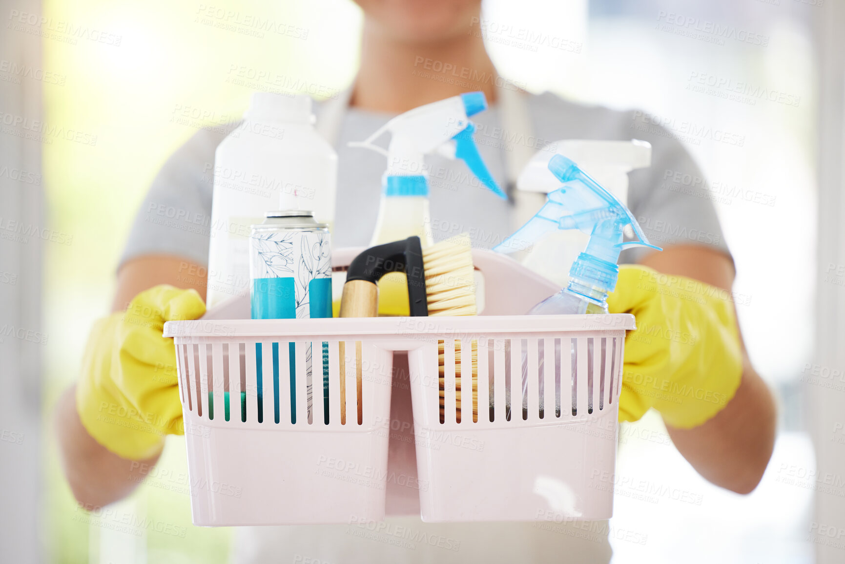 Buy stock photo Person, hands and basket with cleaning supplies for disinfection, housekeeping or domestic detergence. Closeup of cleaner or maid with bucket, gloves or chemicals for bacteria or germ removal service