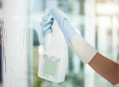 Buy stock photo Person, cleaner and window with spray bottle for disinfection, housekeeping or cleaning service at home. Closeup of maid with gloves and logo on chemical liquid on glass for hygiene or bacteria