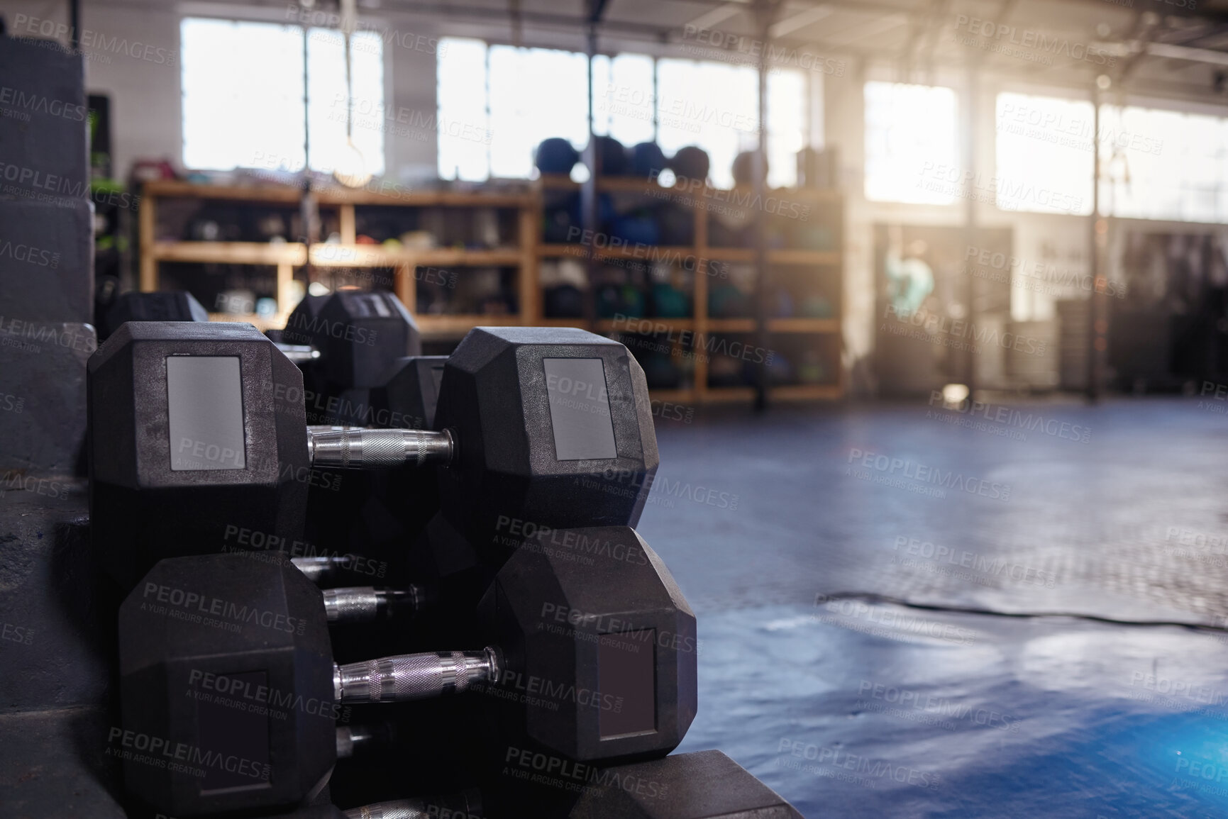 Buy stock photo Sports, gym and dumbbells in empty room for fitness, wellness and body transformation, change or progress. Workout, equipment and weights at health club for never give up, motivation or resilience