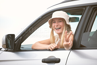 Buy stock photo Happy woman, portrait and car with peace sign for roadtrip, journey or fun outdoor adventure In nature. Female person or tourist with smile or emoji in vehicle for holiday drive, weekend or vacation