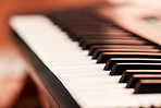 Closeup shot of black and white piano keys. Above shot of a sharp and flat piano keys. Music can motivate and inspire. Let your creative juices flow into your art through the rhythm and sound of music