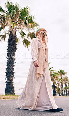 Buy stock photo Fashion, city and Muslim woman in street with style, trendy clothes and casual outfit in Saudi Arabia. Religion, hijab and Islamic person with confidence, pride and sunglasses on summer weekend