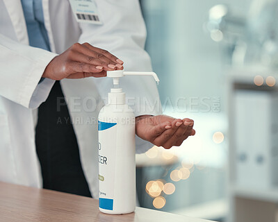 Buy stock photo Healthcare, doctor and hand sanitizer for virus safety, protection and prevention in hospital. Professional, desk and physician with washing and bacteria risk in a clinic with pathology expert