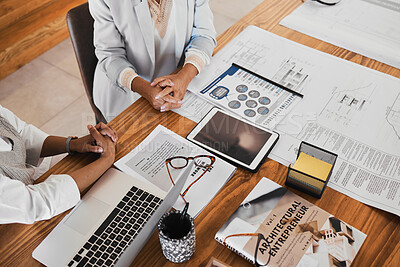 Buy stock photo Architecture, planning and hands on desk with laptop in meeting with paperwork, illustration and documents. Teamwork, collaboration and architects in discussion with proposal, blueprints and notebook