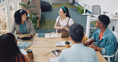 Buy stock photo Meeting, creative team and business people at table planning strategy, brainstorming or discussion in startup office. Collaboration, technology and designer group working on graphic project together