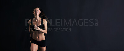 Buy stock photo Fitness, mockup and portrait of woman in studio running for competition, race or marathon training. Sports, workout and female athlete with cardio exercise for health or wellness by black background.
