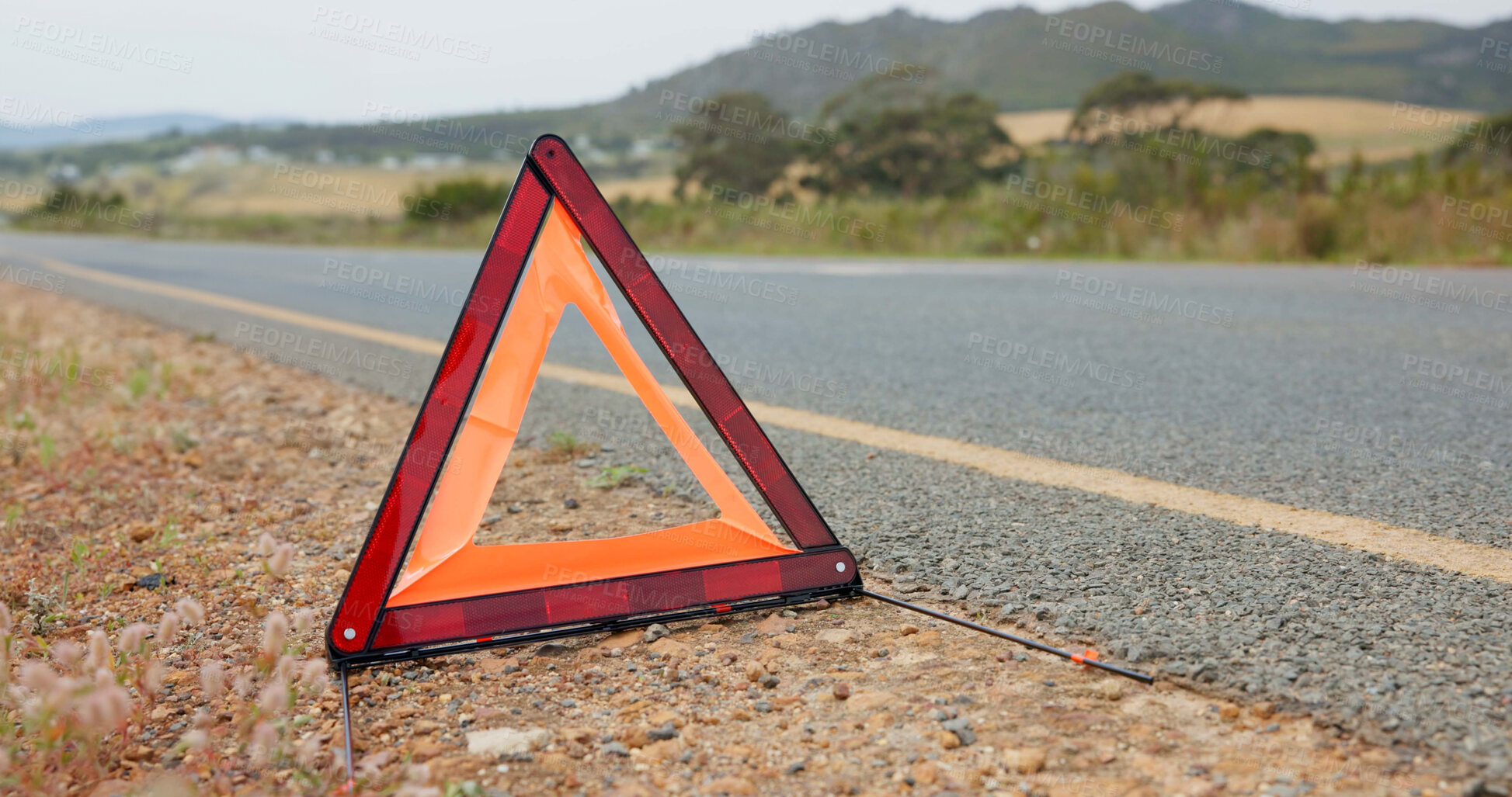 Buy stock photo Road, triangle and car breakdown for shape, sign or vehicle assistance in the outdoor countryside. Asphalt, street or sidewalk safety symbol for warning, signal or traffic control to alert attention