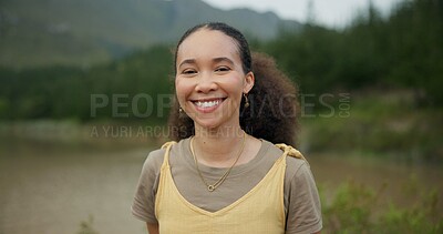 Nature, smile and face of young woman on a vacation, weekend trip or adventure in a forest. Happy, travel and portrait of African female person with positive and good attitude for outdoor adventure.