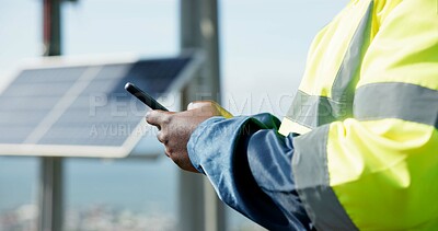 Man, phone and hands typing for social media, communication or solar panel research on rooftop. Closeup of person, contractor or technician on mobile smartphone for online networking or photovoltaic