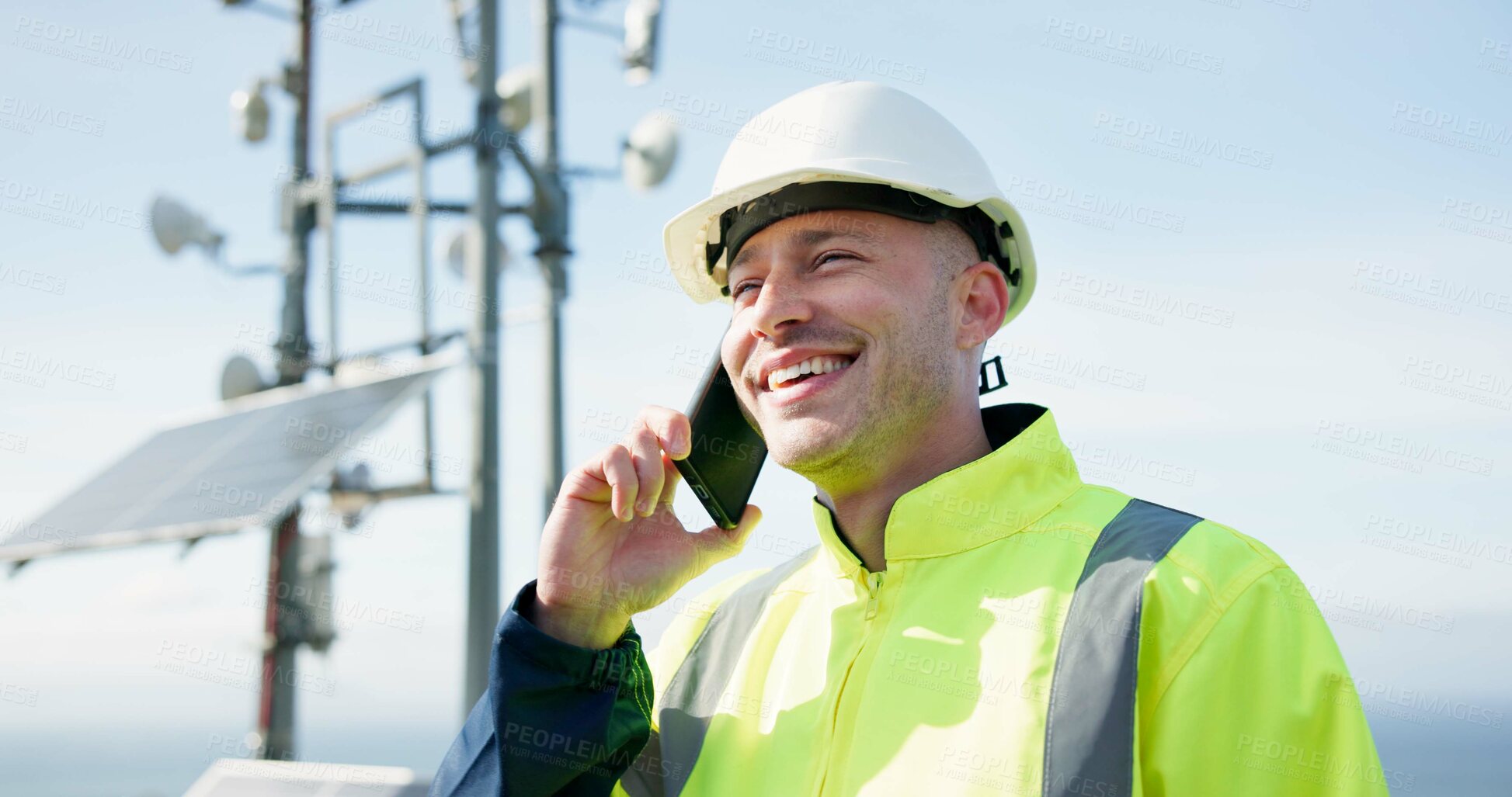 Buy stock photo Happy man, phone call and engineer in conversation for solar panel maintenance or inspection on rooftop. Person, contractor or technician smile on mobile smartphone in discussion for communication