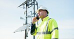 Man, phone call and engineer in conversation for solar panel maintenance or inspection on rooftop. Male person, contractor or technician talking on mobile smartphone in discussion on renewable energy