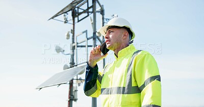Man, phone call and engineer in conversation for solar panel maintenance or inspection on rooftop. Male person, contractor or technician talking on mobile smartphone in discussion on renewable energy