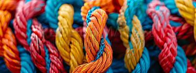 Knot, color and pattern of rope with connection, bundle and texture for craft, safety or strong network. String, thread or yarn on wallpaper with abstract textile, creative lines or rainbow diversity