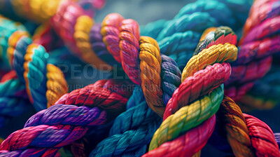 Knot, color and connection of rope with bundle, support and texture for diversity, safe or strong network. String, thread or yarn on wallpaper with abstract textile, creative lines or rainbow synergy