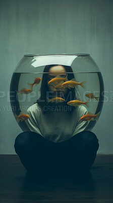 Fishbowl, head and person with depression, memory or anxiety for mental health awareness in surreal art. A goldfish tank covering face for psychology, drowning and bad thoughts, mind or life crisis