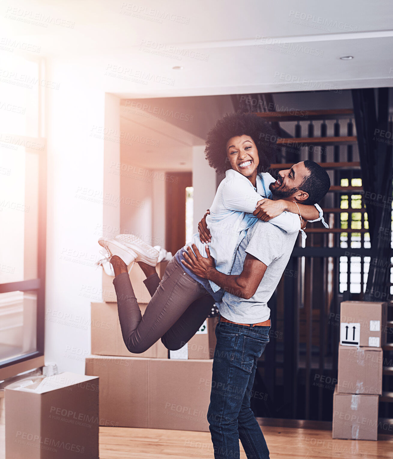 Buy stock photo Moving in portrait, couple hug and love with real estate sale and cardboard boxes at new apartment. Happiness, excited and African woman and man together with a smile from mortgage and property deal