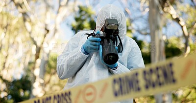 Csi, photographer and police tape at crime scene for investigation in forest with evidence and safety hazmat. Forensic quarantine, expert investigator and pictures for observation and case research