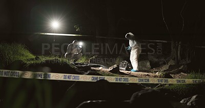 Forensic team, photographer and crime scene at night for investigation or observation with hazmat or police tape. Collaboration, expert investigator or outdoor in forest for evidence or case research