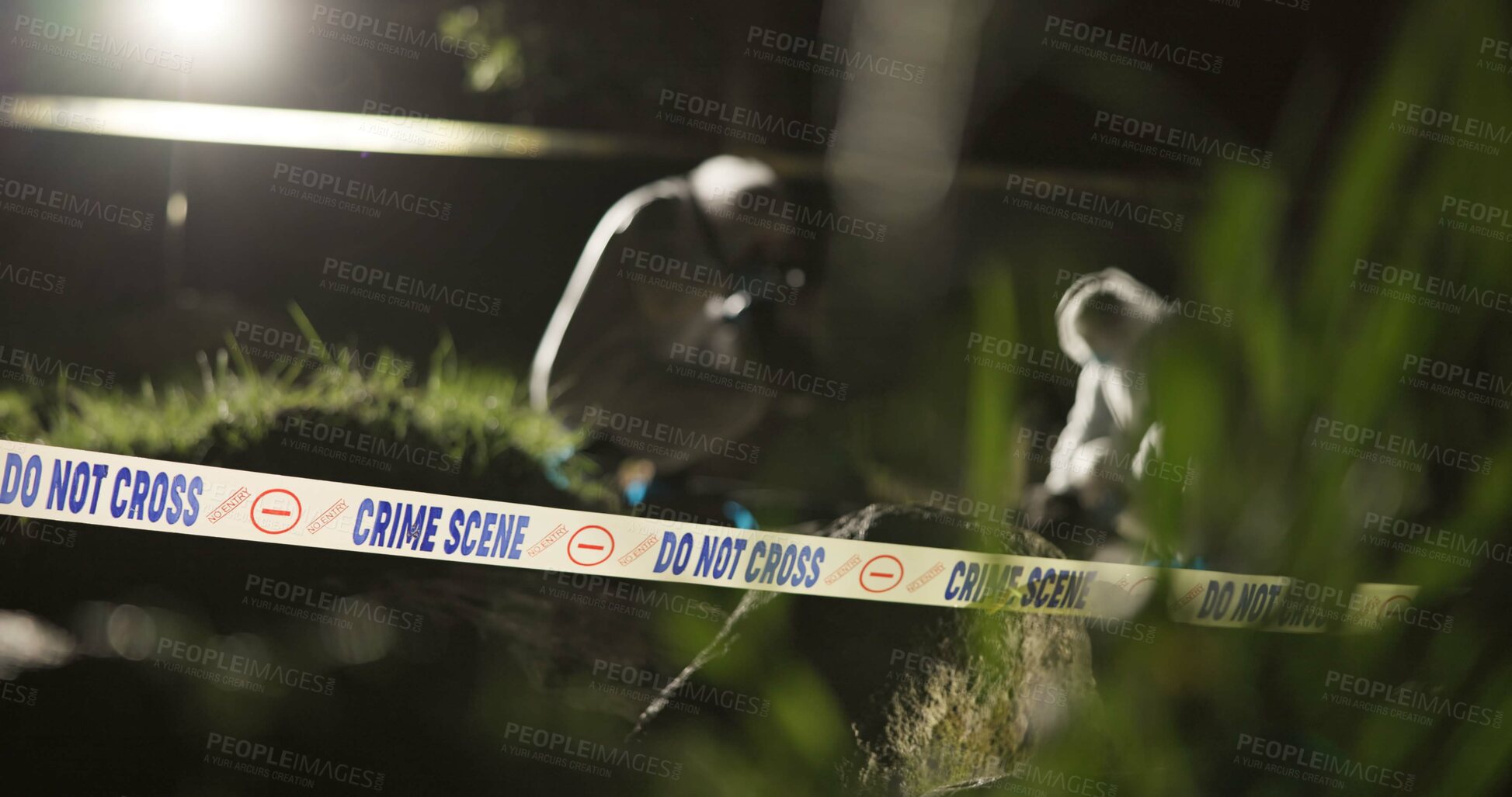 Buy stock photo Crime scene, photography and investigator with evidence outdoor for analysis and investigation in forest or nature. People, detective or forensic photographer at night inspection with tape in woods