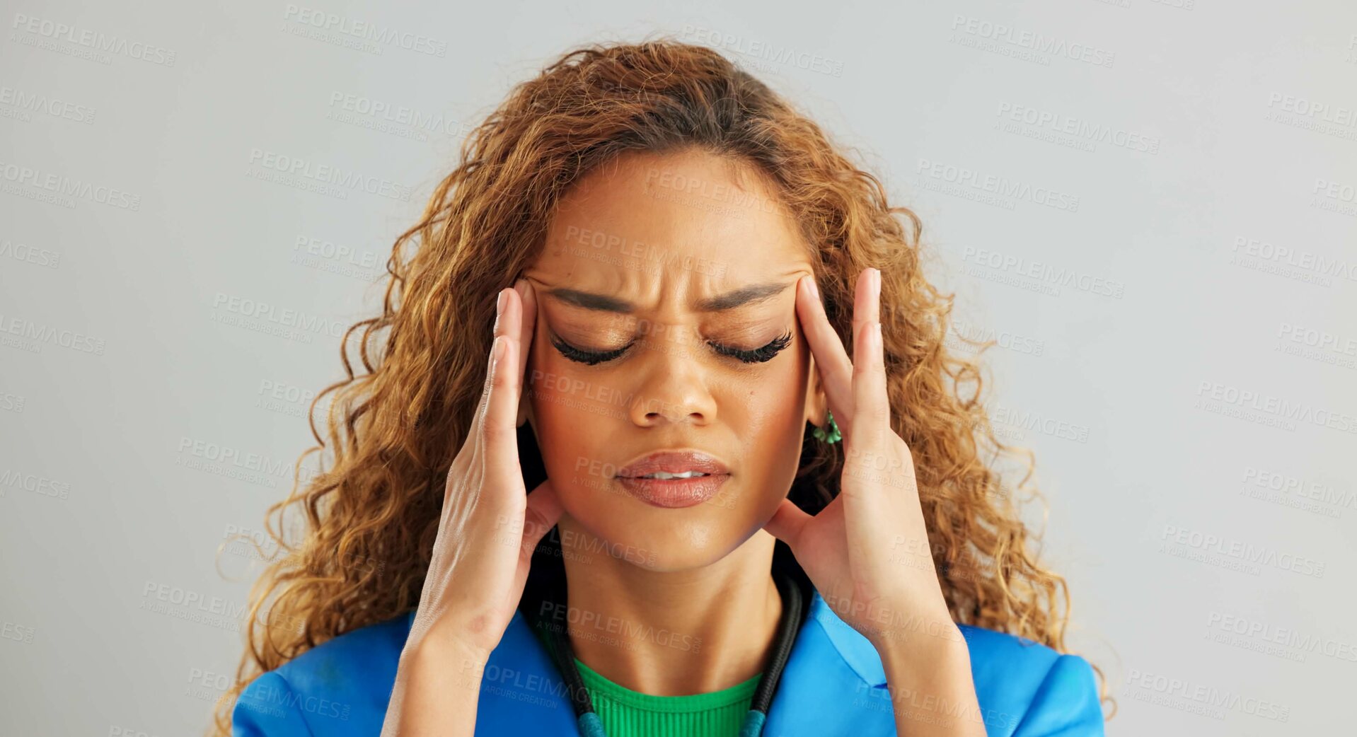 Buy stock photo Frustrated woman, headache and stress with anxiety, mental health or depression on a gray studio background. Face of tired female person in fatigue, pressure or tension with overwhelmed emotion