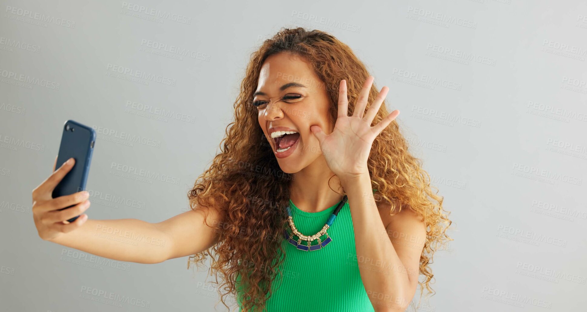 Buy stock photo Happy woman, peace sign and selfie with kiss for social media, vlog or memory on a gray studio background. Female person with smile on mobile smartphone for photography or picture on mockup space