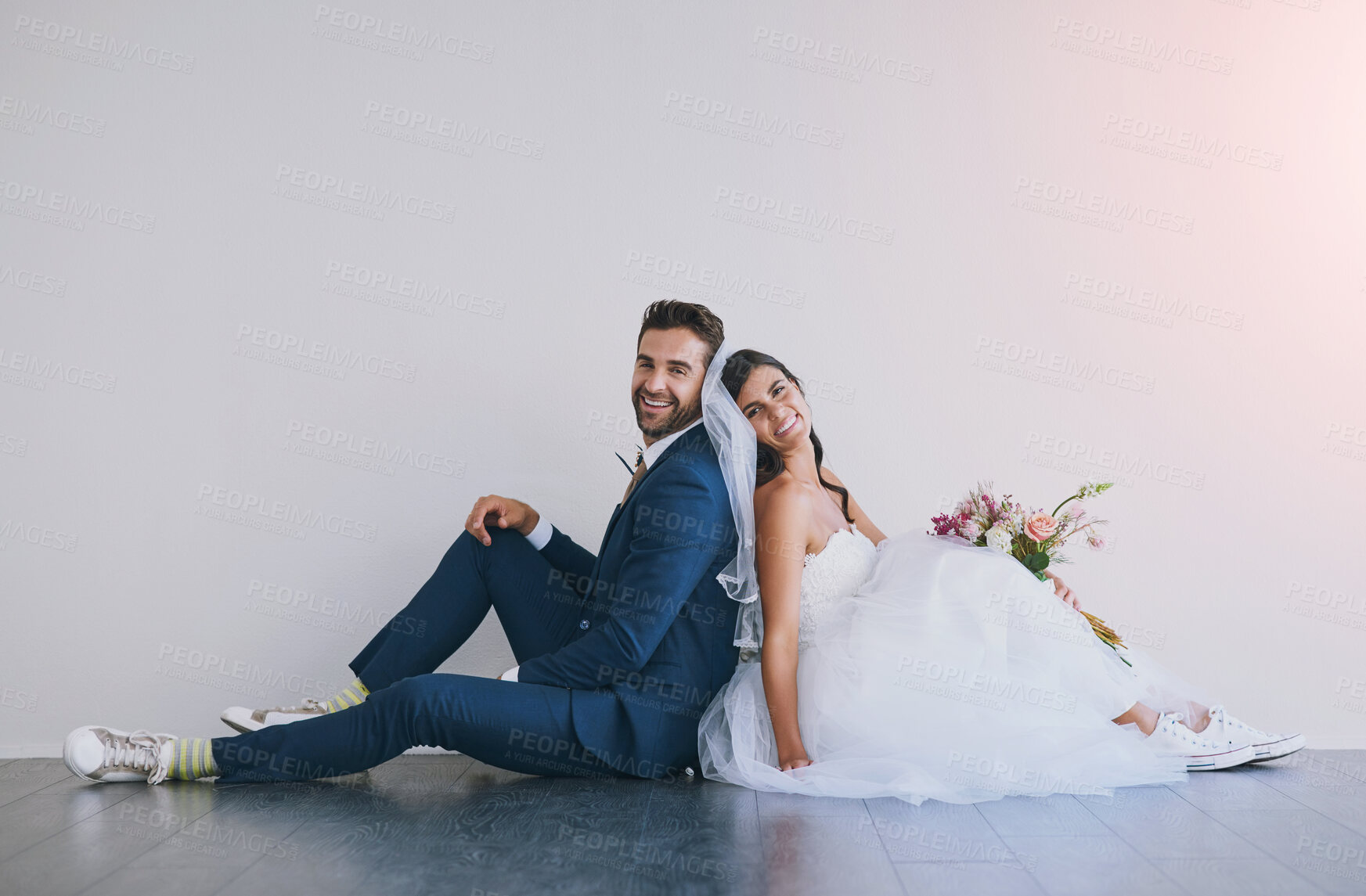Buy stock photo Couple, wedding and church portrait with smile, happy and sitting on floor after marriage ceremony and event. Celebration, love and people with bouquet of bride with commitment announcement.
