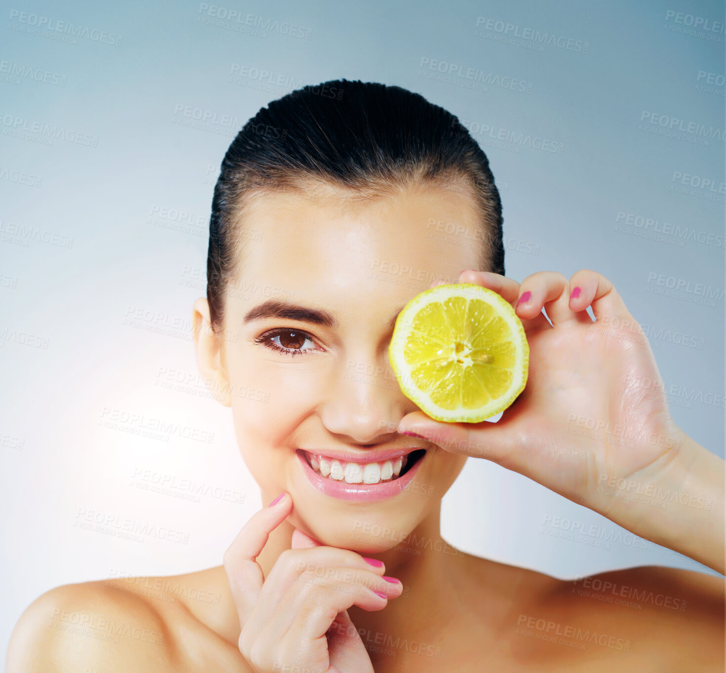 Buy stock photo Lemon, skincare and portrait of woman in studio with natural, organic and face routine with vitamin c. Beauty, cosmetic and female person with citrus fruit for facial dermatology by blue background.