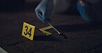 Evidence marker, csi and swab of blood at crime scene with forensic on floor at night for investigation of murder. Professional, expert in gloves and case investigator with observation and search