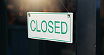 Coffee shop, closed sign and front door for notice on board, information and guide for news at store. Poster, window and message at storefront in closeup at small business, cafeteria and restaurant