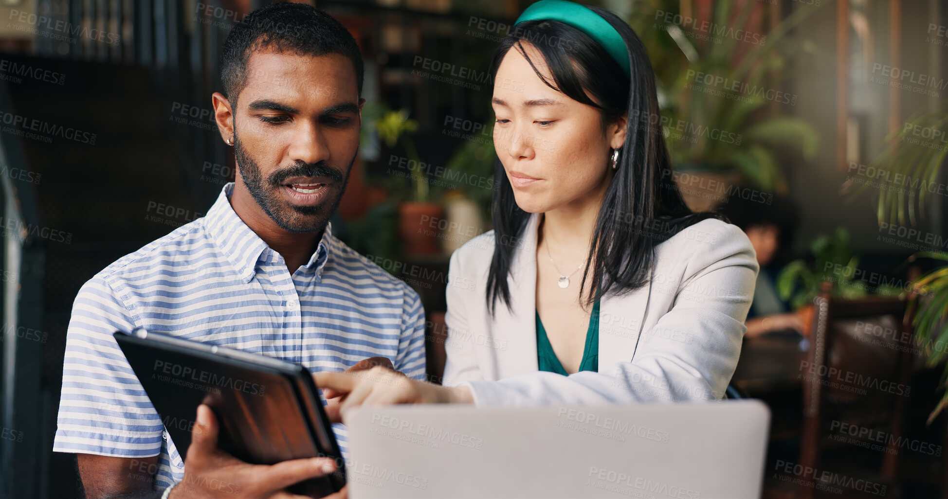 Buy stock photo Business people, laptop and tablet at cafe for research, schedule planning or design in creative startup. Happy man and woman working with technology on project, brainstorming or ideas at coffee shop